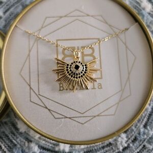 Bb lila Gold and Black Sunburst Pendant Necklace